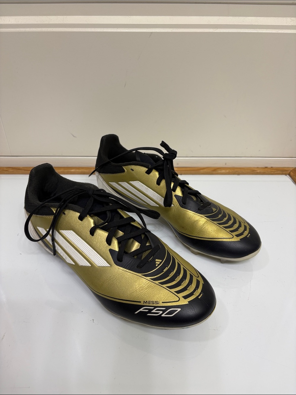 adidas F50 Men's Soccer Cleats in Gold and Black